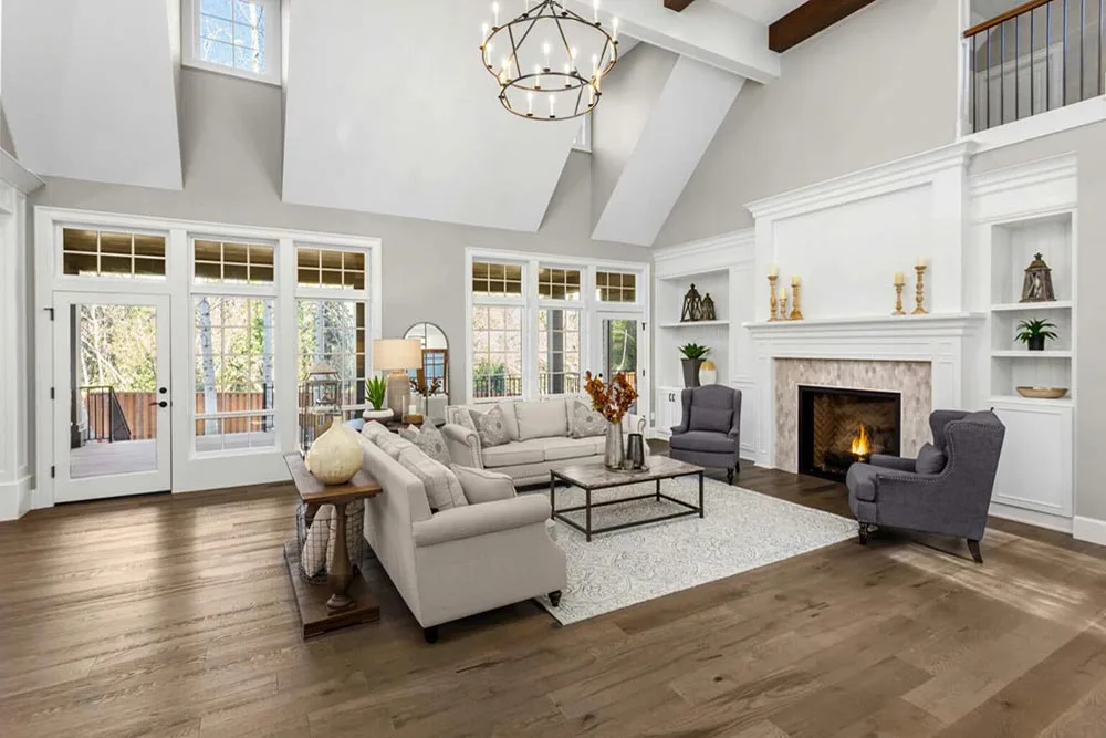 A clean and restored living room after smoke and soot removal, featuring bright walls, spotless furniture, and a fresh, welcoming atmosphere.